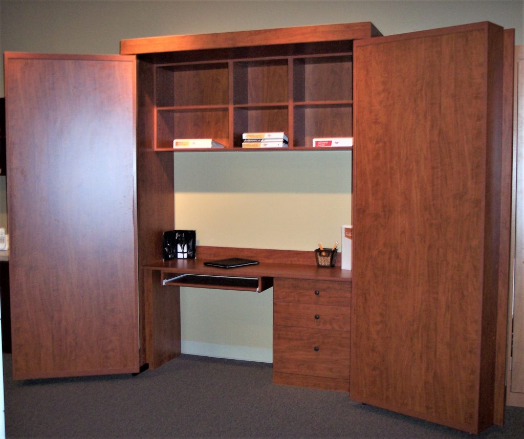Craft room with storage wall