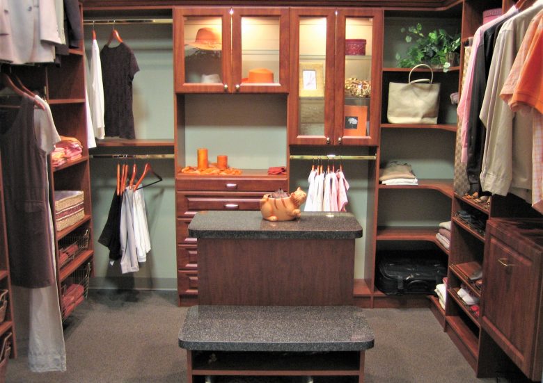 Custom glass-front closet installed for Patricia Ucci